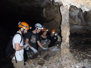 Dr. Brauer with students in a cave