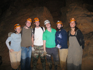 Dr. Brauer with students in a cave