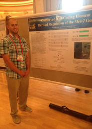 Tucker Munday with research poster