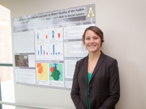 Tara Early with research poster
