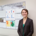 Tara Early with research poster